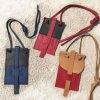Handytasche aus Leder in schwarz/blau, schwarz/rot, cognac/rot für kleine und große Smartphones, Karten und Geld. Handytasche zum Umhängen, Crossbody und als Gürteltasche.